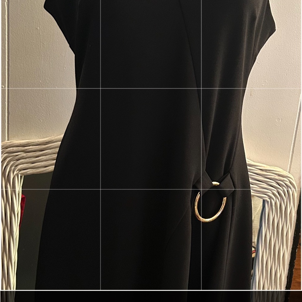 Elegant Black Dress with Gold Accent